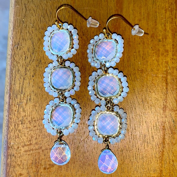 Beautiful earrings that I bought at a boutique. They’re white luminescent - Picture 2 of 4